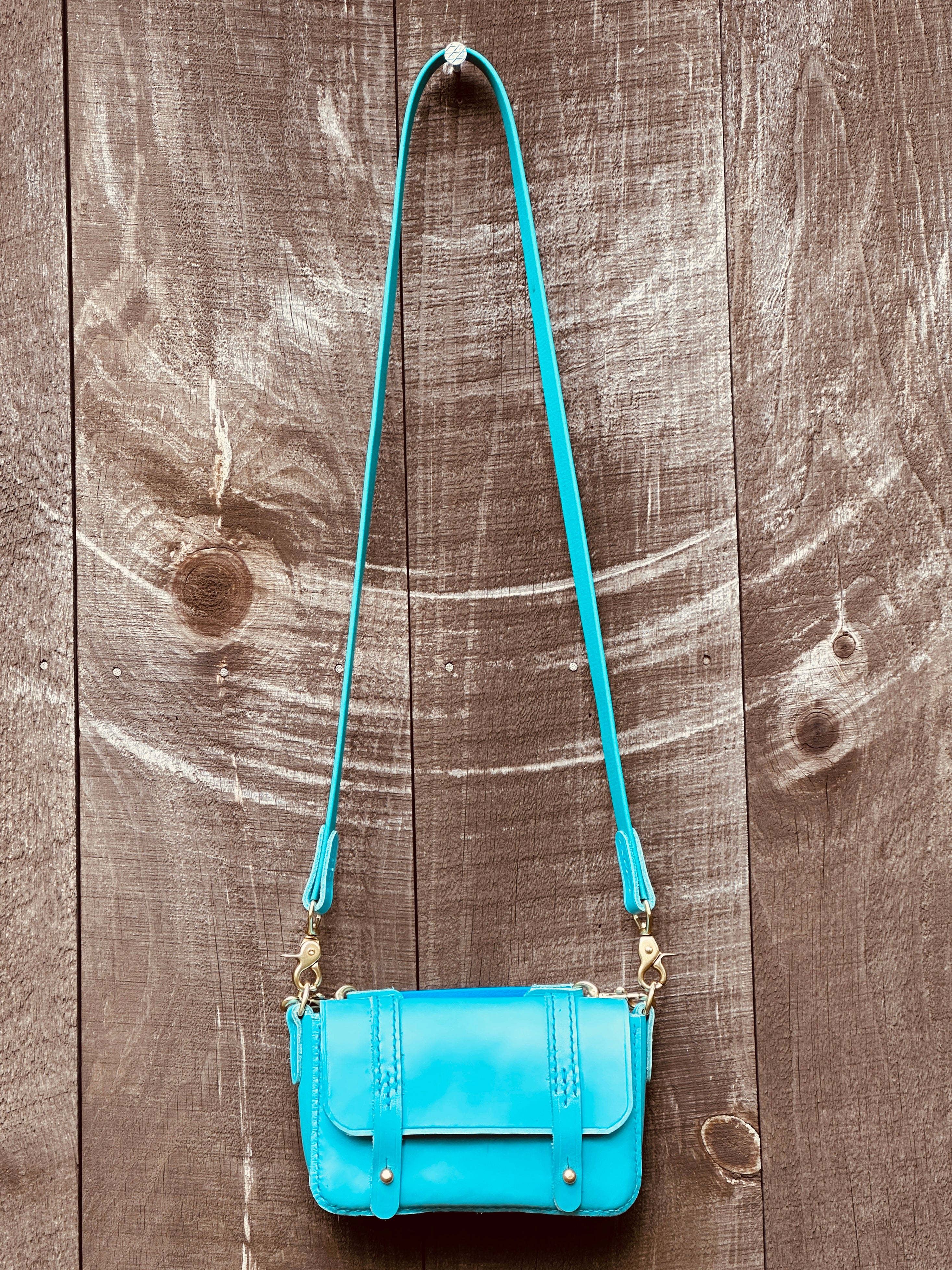 Turquoise store crossbody bag